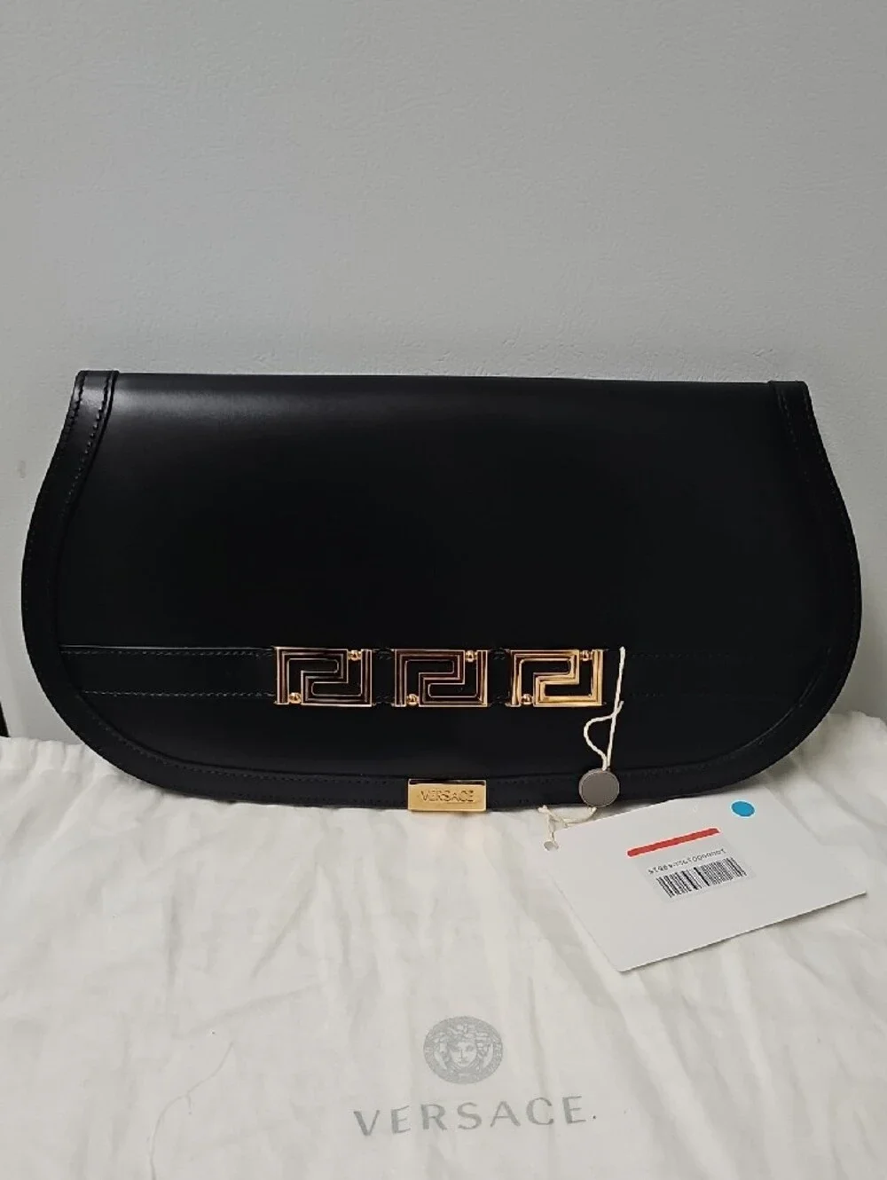Versace Black Leather Clutch with Gold Greek Key Accent